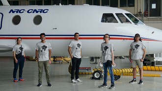 (From left) U of A Space Design Group members Amira Aissiou, Rahul Ravin, Shankar Jha, Kinston Wong & Kirtan Dhunnoo stand in front of the Falcon 20 aircraft they boarded to test bioengineered knee cartilage in simulated microgravity. (Photo: SEDS-Canada)